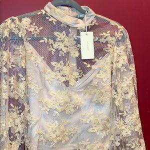 Peach brand see through floral pattern shirt.
